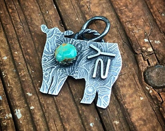 Sterling Heifer w/ Brand and Turquoise
